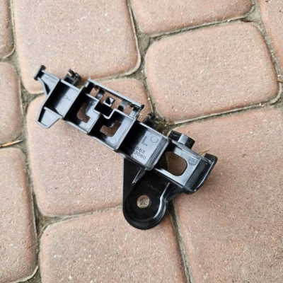 Uchwyt mocowanie ślizg zderzaka tył lewy Toyota Camry VIII XV70 52563-33060