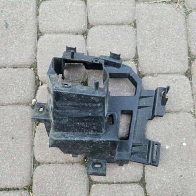 Mocowanie uchwyt halogenu lewego podstawa Citroen Berlingo 9816770480