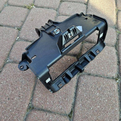 Obudowa osłona mocowanie radia deski konsoli Opel Corsa F 39176209