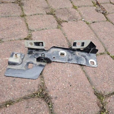 Uchwyt mocowanie wspornik błotnika zawiasu maski P Renault Zoe 654825654R