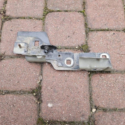 Uchwyt mocowanie wspornik błotnika zawiasu maski L Renault Zoe 654833942R