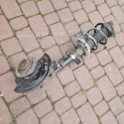 Amortyzator zwrotnica przód przedni lewy Renault Zoe 543028406R