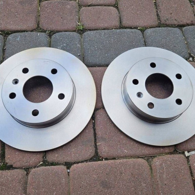 Tarcze ty tylne komplet Astra H G Combo Corsa C Zafira A 95526658