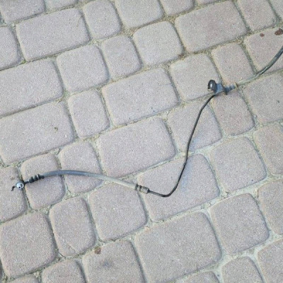 Przewód hamulcowy zacisku tył tylny ABS prawy elastyczny Opel Astra L