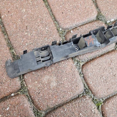 Ślizg tył tylny mocowanie zderzak prawe wspornik Opel Corsa E 39002838