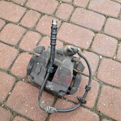 Zacisk przód przedni lewy jażmo hamulcowy Opel Combo E