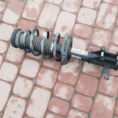 Amortyzator przedni lewy Opel Astra J IV 13354029