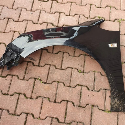 Błotnik przedni lewy Opel Astra J 4 IV Z22c GTC