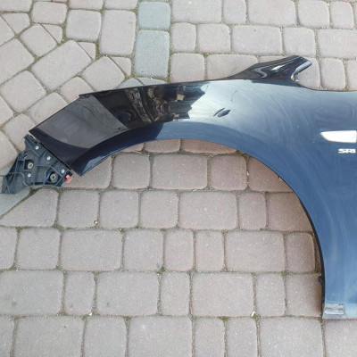 Błotnik przód lewy Opel Astra J 4 IV Z22c