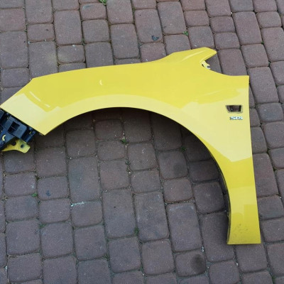 Błotnik przód przedni GTC Opel Astra J 4 IV Z40Q