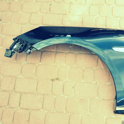 Błotnik przód przedni lewy Opel Astra K Z30V IGŁA