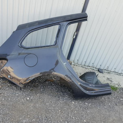 Błotnik tył tylny cwiartka Opel Astra J IV kombi