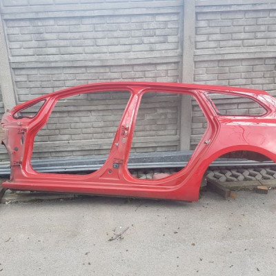 Ćwiartka błotnik bok podłużnica Opel Astra J 4 IV