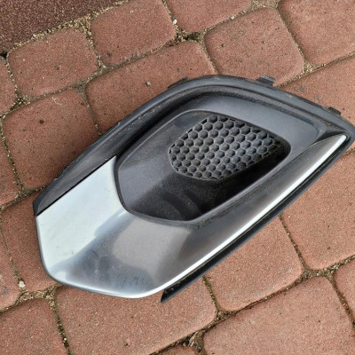 Kratka zderzaka lewa Opel Corsa E 13451958