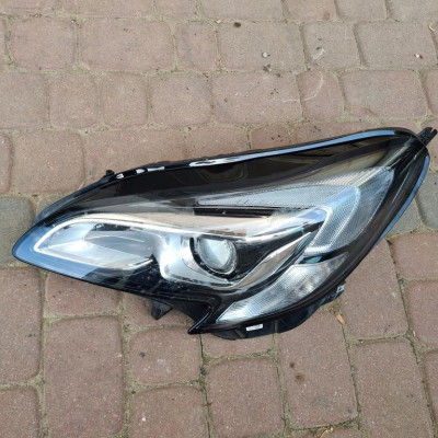 Lampa przód przednia lewa Opel Corsa E 13381347