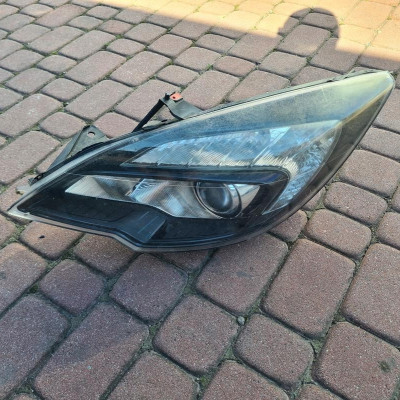 Lampa przód soczewka Opel Meriva B 13253635