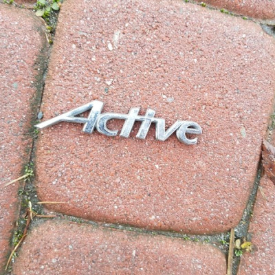 Napis emblemat na błotnik Opel Astra J IV