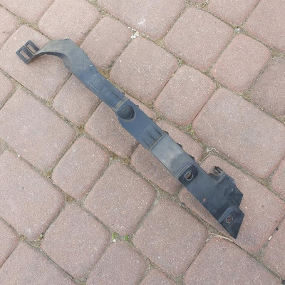 Ślizg błotnika lewy Opel Astra J IV 13287640