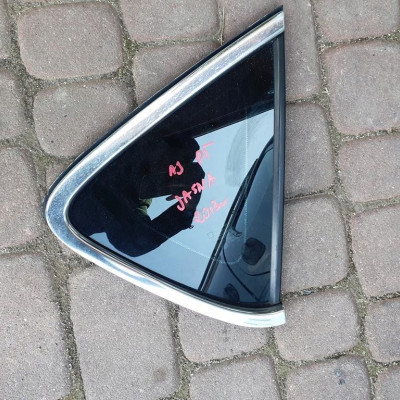 Szyba tył chrom 2013r Opel Astra J IV jasna FOLIA