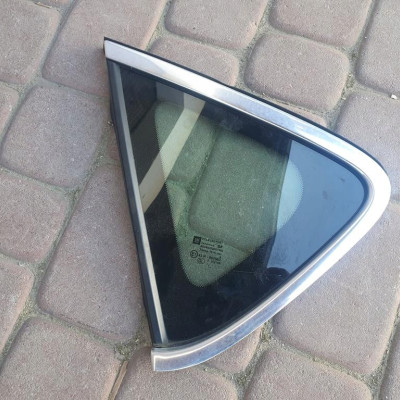 Szyba tył tylna chrom lewa 2011r Opel Astra J IV