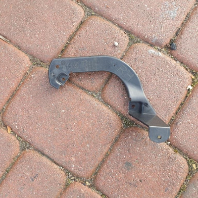 Uchwyt mocowanie halogenu FL Opel Corsa D 13345361