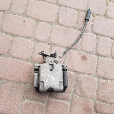 Zacisk hamulca tylni lewy Opel Insignia 22752387