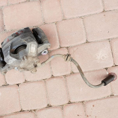 Zacisk hamulcowy prawy Opel Astra J IV 13430603