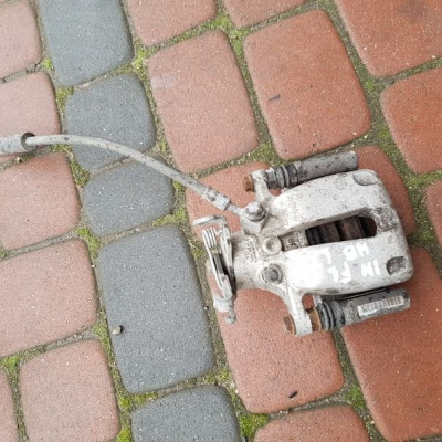 Zacisk hamulcowy tył lewy Opel Insignia 22781288