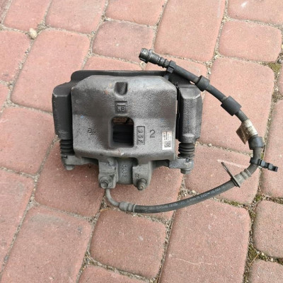 Zacisk przód przedni Opel Insignia B 84120873