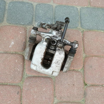 Zacisk tył tylny lewy 1.4T Turbo Opel Astra 5 V K