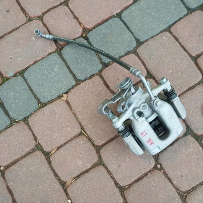 Zacisk tył tylny lewy Opel Astra K 5 V 39021737