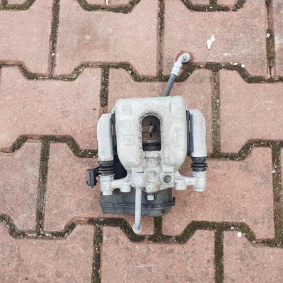 Zacisk tył tylny lewy Opel Astra K V 39180478