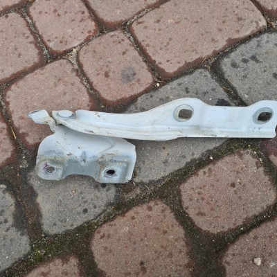 Zawias maski lewy biały Opel Mokka 95141368