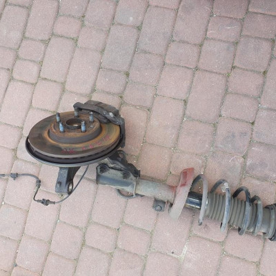 Zwrotnica amortyzator L Opel Astra J IV 13354027