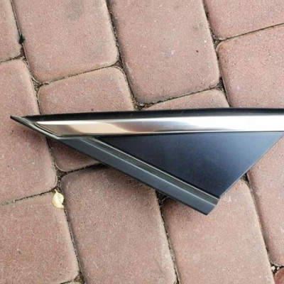 Zaślepka trójkąt lewy przód Astra K V 39041995