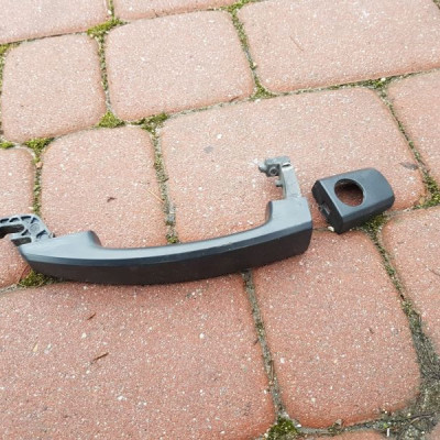 Klamka drzwi przód przednia Opel Corsa D