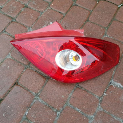 Lampa prawy tył Opel Corsa D 13211841
