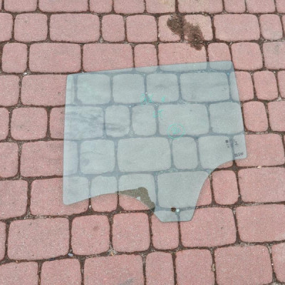 Szyba drzwi lewy tył kombi Astra K 2021r