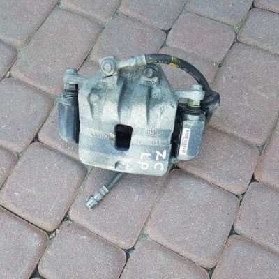 Zacisk przedni lewy Opel Astra J IV 4 22958765