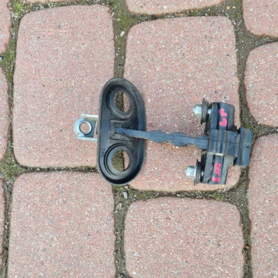 Ogranicznik drzwi lewy przód Opel Combo D