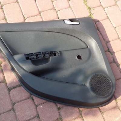 Boczek tapicerka drzwi 5d hatchback skóra Corsa D