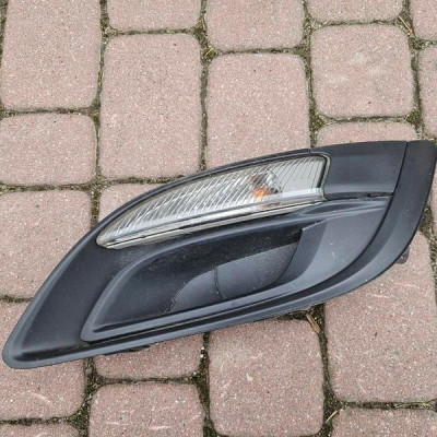 Kratka zderzaka lewa halogen kierunek Opel Astra J IV 13367142 13368714