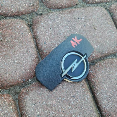 Znaczek logo emblemat kierownicy dekielek poduszka AIRBAG Opel Astra K