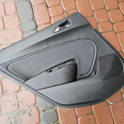 Boczek tapicerka drzwi tył tylna skóra skórzana Opel Astra 4 IV J