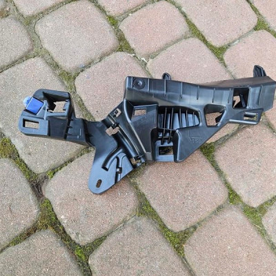 Slizg mocowanie zderzaka lewe Opel Corsa F E-Corsa 39184800 9830072480