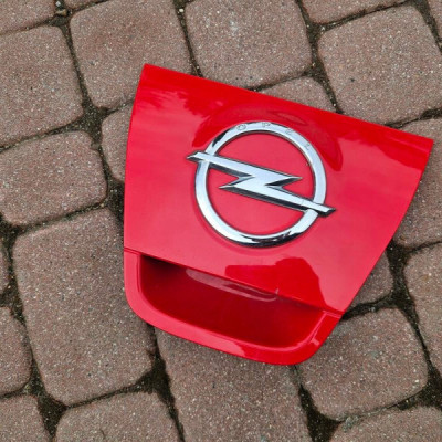 Logo emblemat klapy rączka klapy osłona Opel Astra J 4 IV 13372619 Z50B