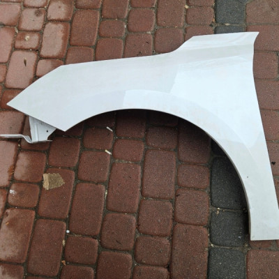 Błotnik przód przedni lewy bialy KVC Opel Corsa F