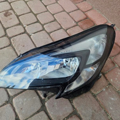 Lampa przód przednie lewa EUROPA reflektor Opel Corsa E 13381335