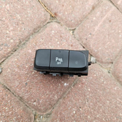 Przełącznik włącznik przycisk PDC parkowania Opel Corsa F YP00031777