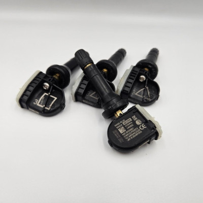 Czujnik cisnienia koła TMPS FORD FoMoCo 2318453 F2GT-1A180-DD ORYGINAŁ
